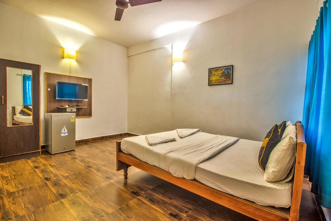 Stanleys Guest House Baga Exterior photo